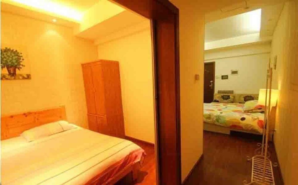 Chengdu Xinyiju Hotel Apartment Extérieur photo